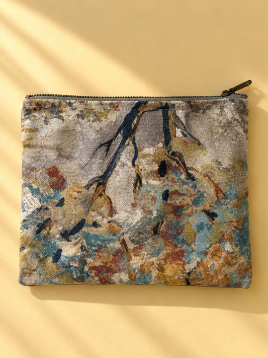 Painterly abstract floral side of the mini-pouch in cream, blue, ochre, and rust