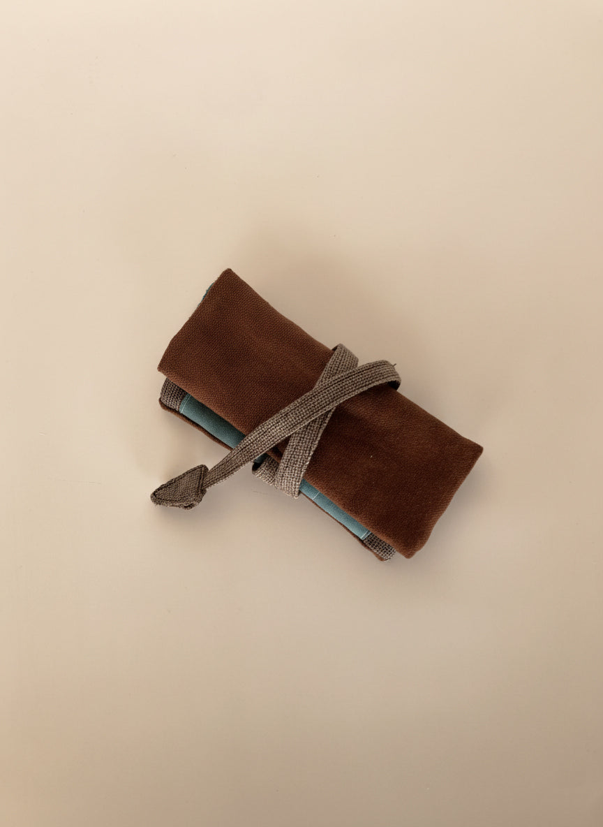 Upcycled multipurpose brick linen devil tail pouch