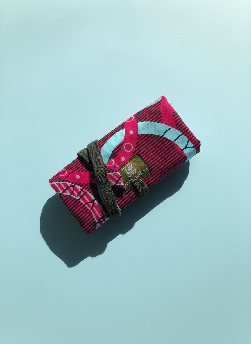 Upcycled multipurpose african devil tail pouch