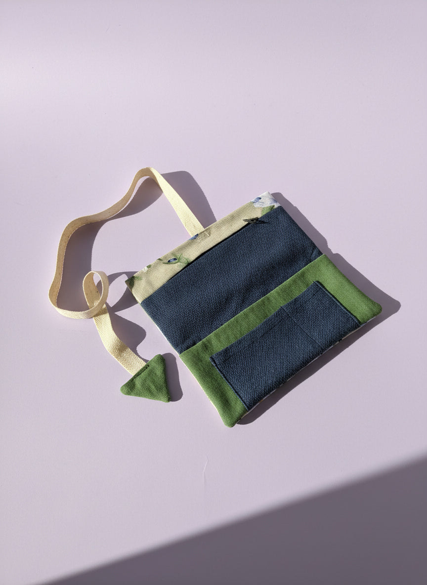 Upcycled multipurpose floral pattern devil tail pouch