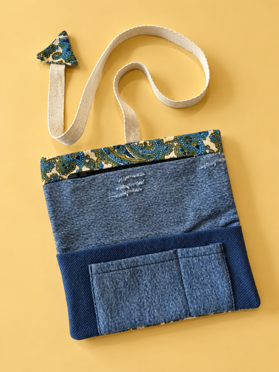 Blue denim patchwork reverse with distressed details, denim pocket and paisley trim