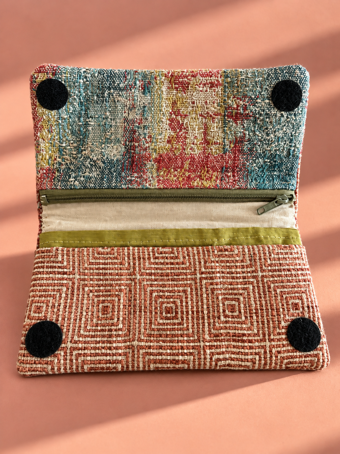 Open geometric Linear Wallet with multicolored inner flap, cream lining and olive-toned zipper