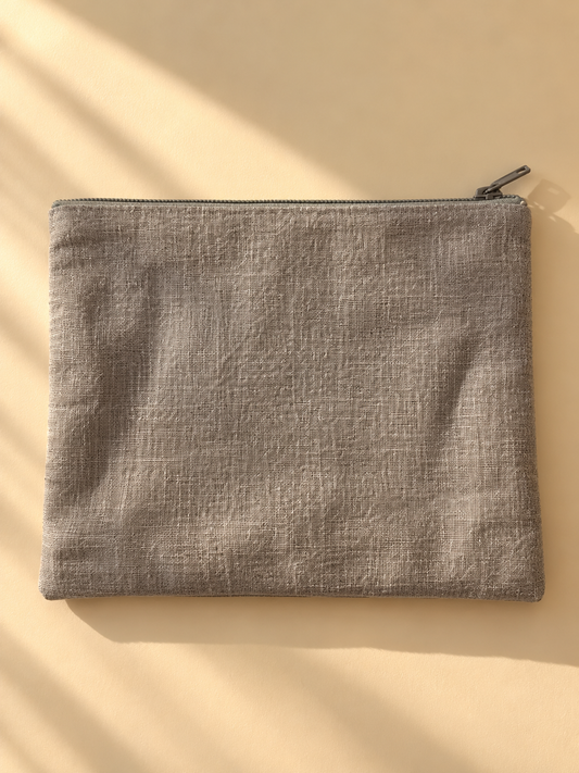 Plain taupe woven opposite side of the zip mini purse