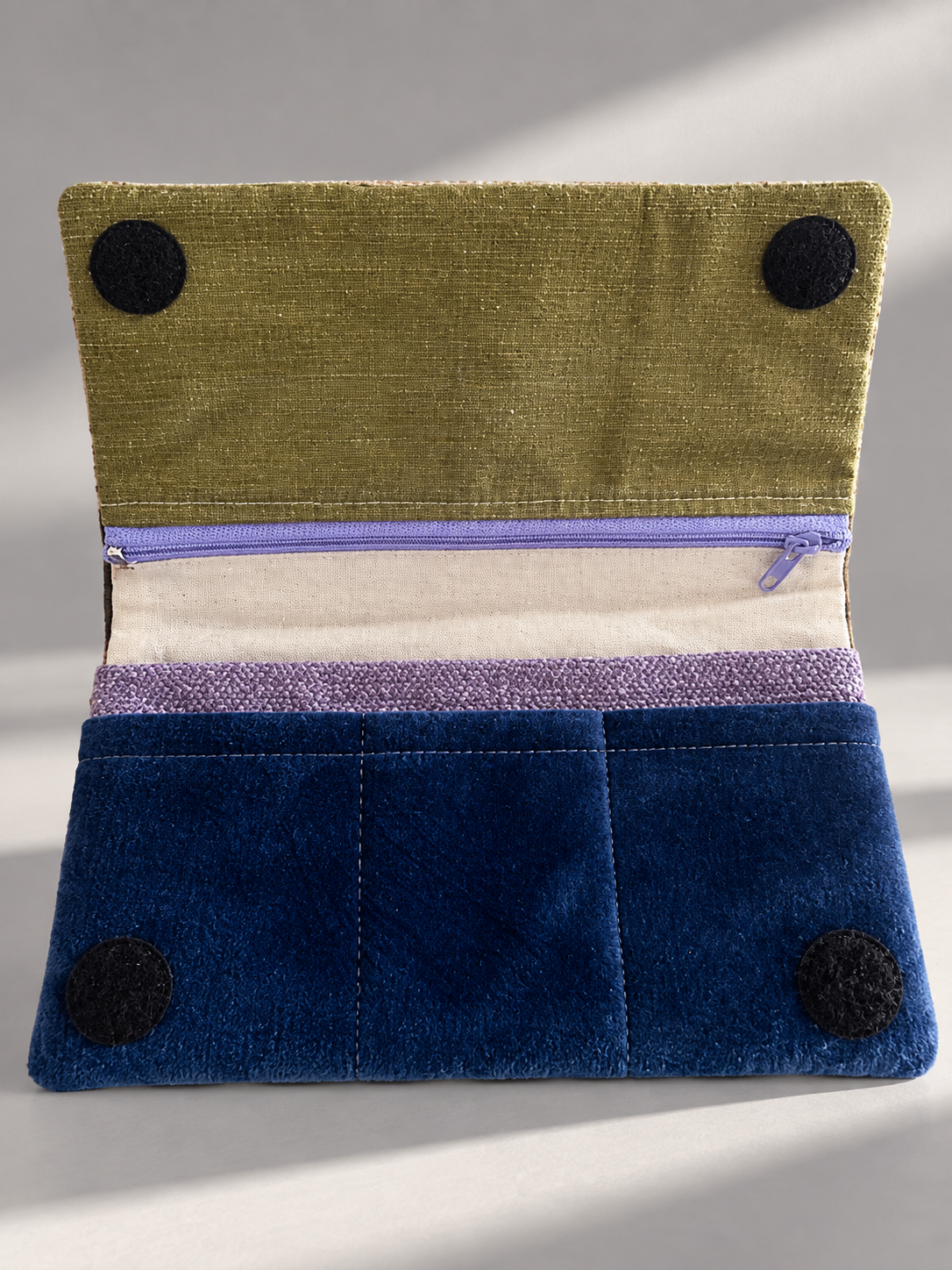 Open Linear Wallet showing navy slip pockets, mustard flap and lilac zipper