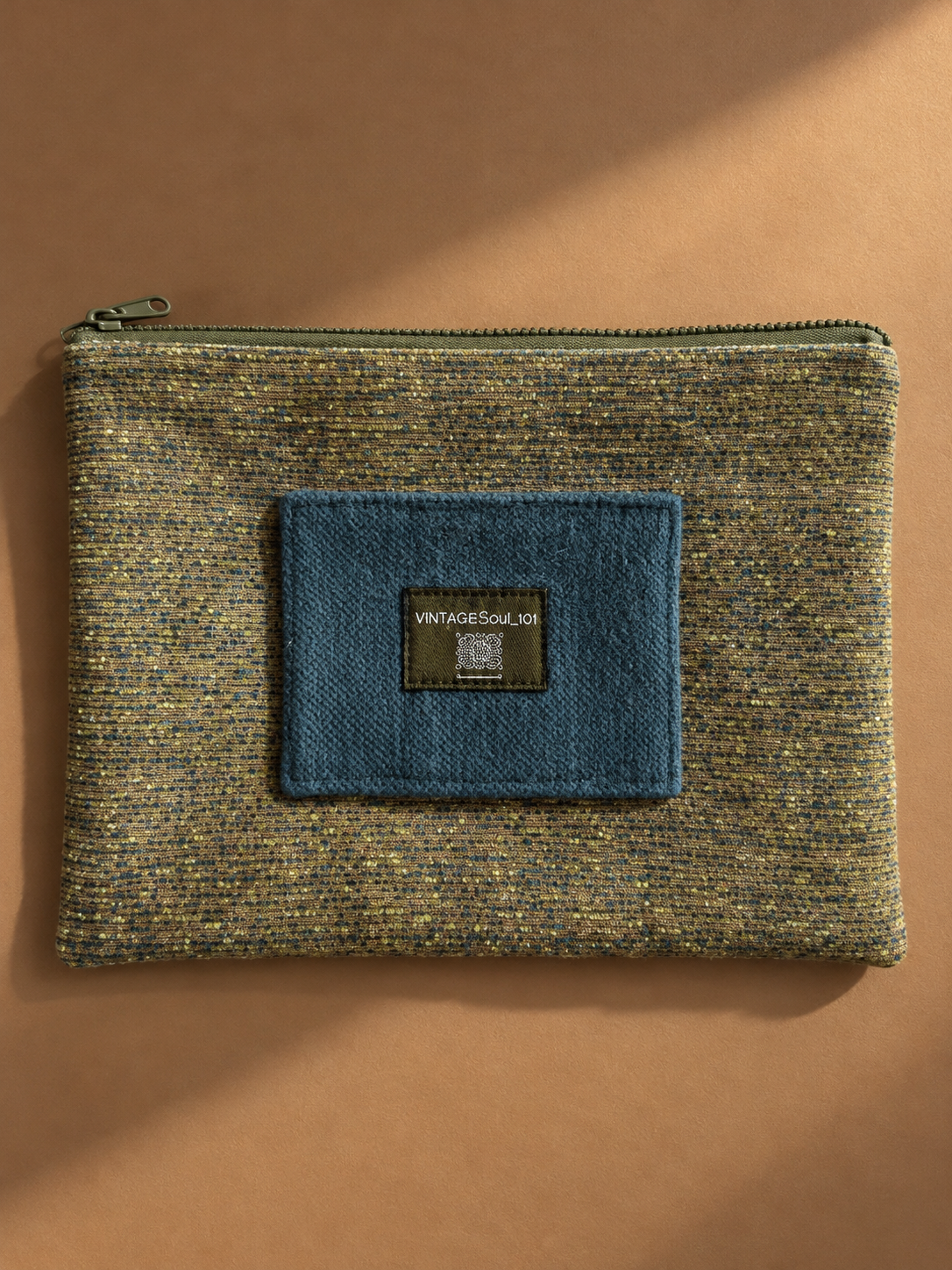 Speckled olive mega-pouch with contrasting teal patch and Vintagesoul 101 label