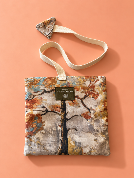 Autumn tree tapestry pouch with cream woven strap and matching triangular detail