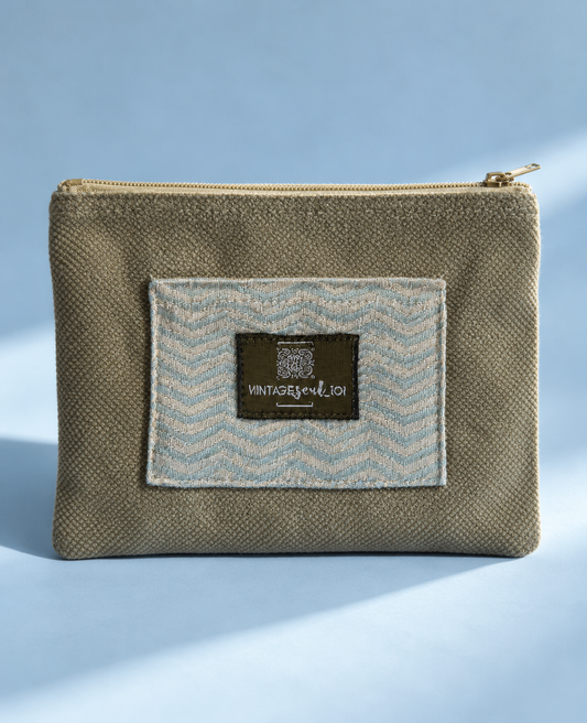 Sage-gray mini purse with pale blue chevron panel and Vintagesoul 101 label