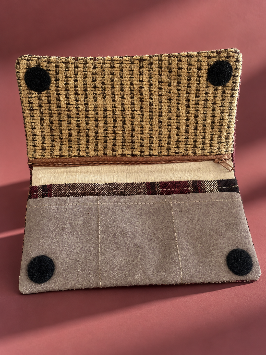 Open striped Mega-Pouch with textured beige flap, taupe slip pockets and zippered compartment