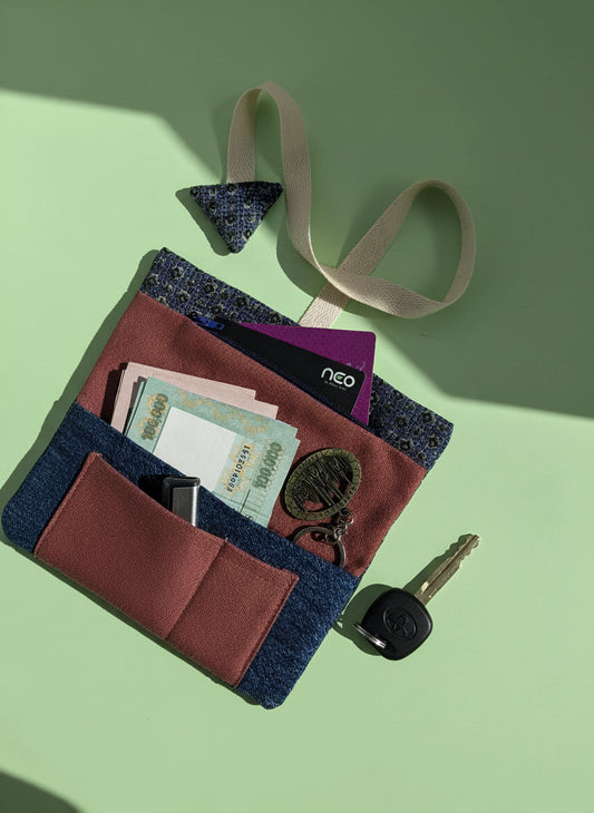Upcycled multipurpose devil tail pouch