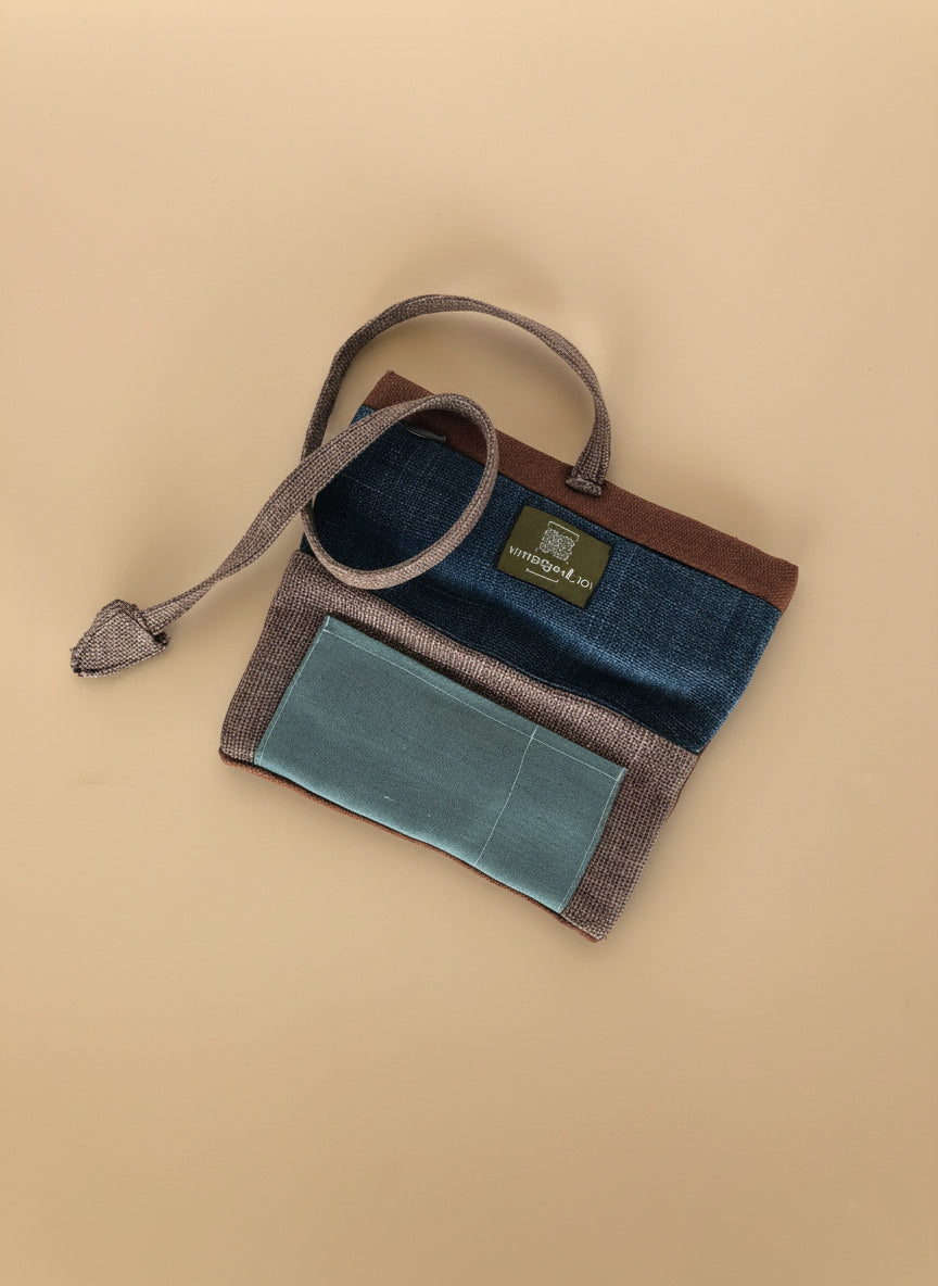 Upcycled multipurpose brick linen devil tail pouch