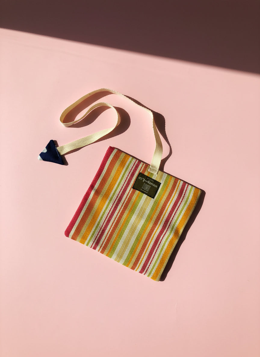 Upcycled multipurpose devil tail pouch