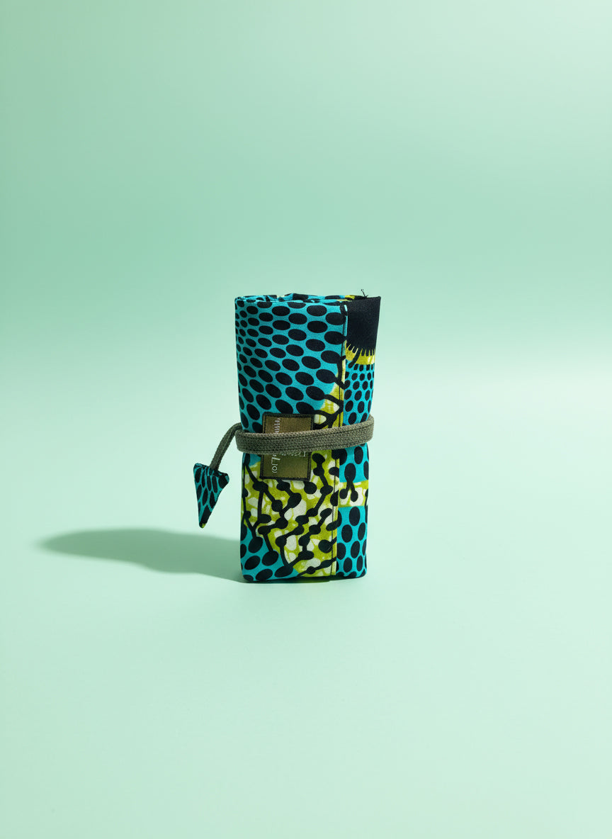 Upcycled multipurpose african devil tail pouch